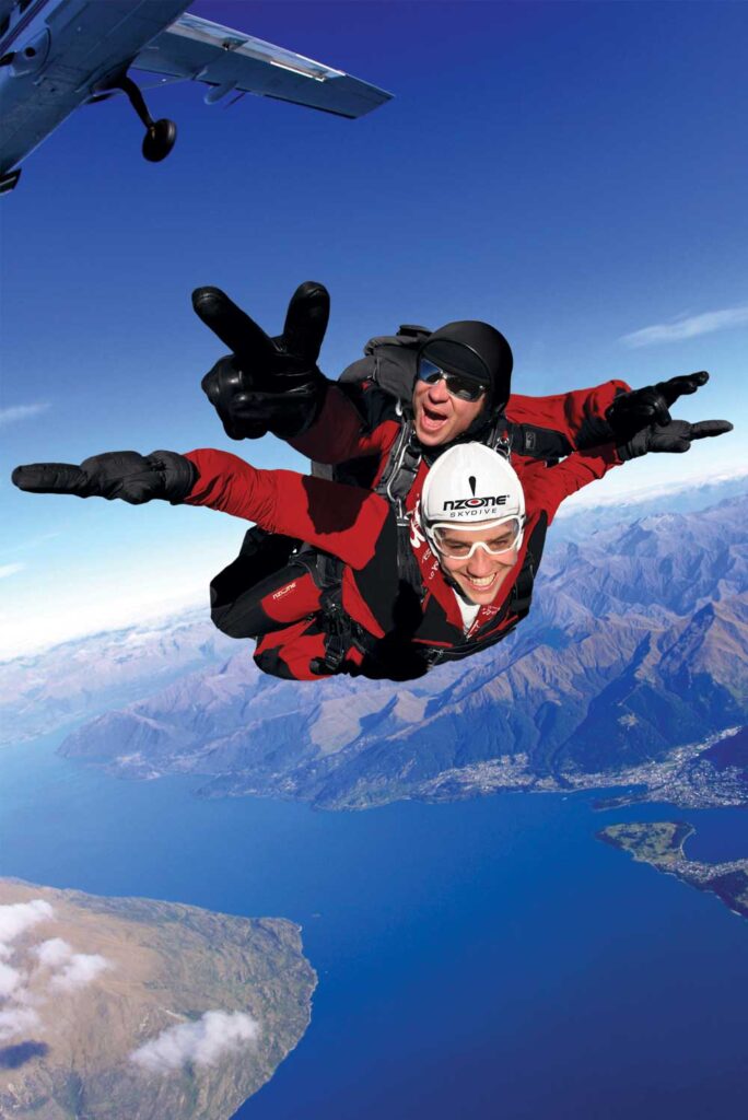 Skydivers enjoying tandem skydive over Queenstown
