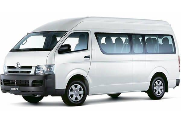 White 12 Seater Toyota HiAce.