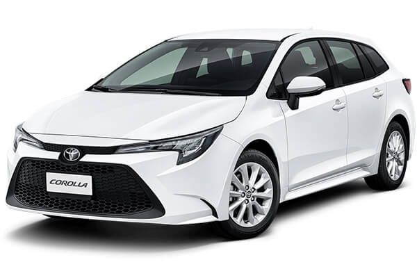 White Toyota Corolla Stationwagon.