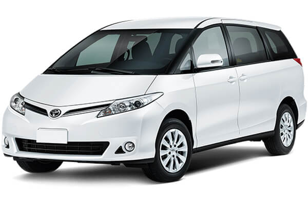 White Toyota Estima.