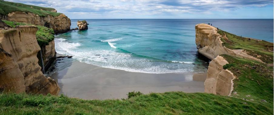 Tunnel Beach with waves coming in.