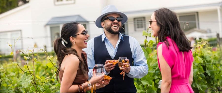 Friends chatting while at a Toast Martinborough event.