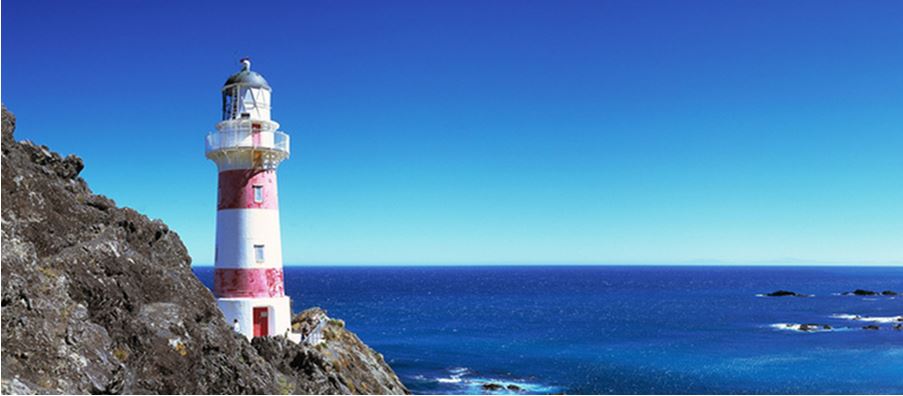 Cape Palliser Lighthouse overlooking the sea.
