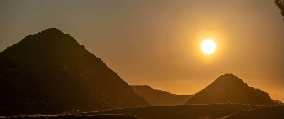 Pyramids of Okia Reserve during sunset.