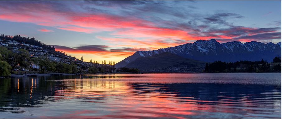 A beautiful red, purple and blue sunset view over Lake Wakatipu.