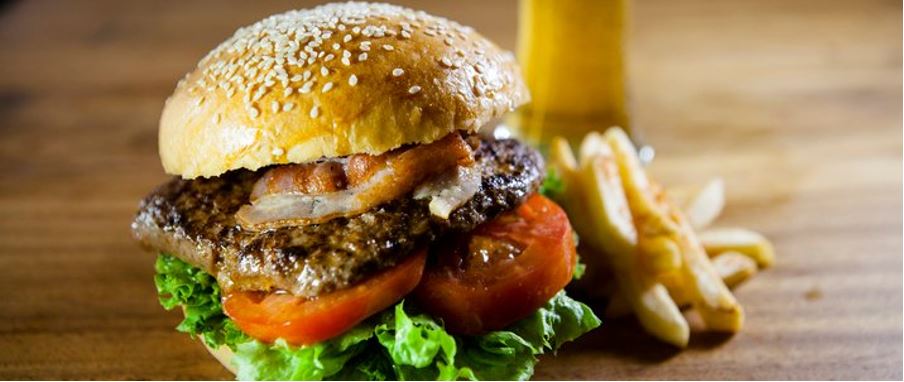 a delicious burger with chips from Fergburger.