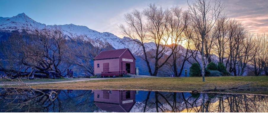 iconic hutt in Glenorchy and the spectacular landscape in the background.